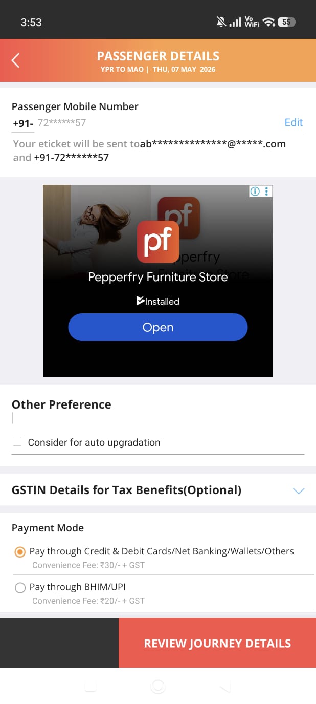 Passenger Details screen — full Pepperfry furniture ad interrupts the form